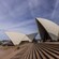 Steps leading up to the modern design of the Opera House by the harbor in Sydney, Australia
